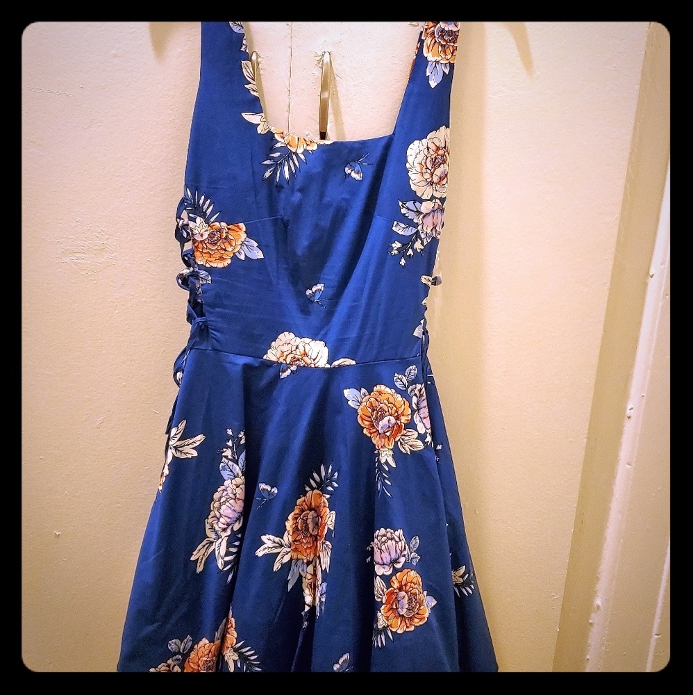 Blue vintage style dress with flower pattern